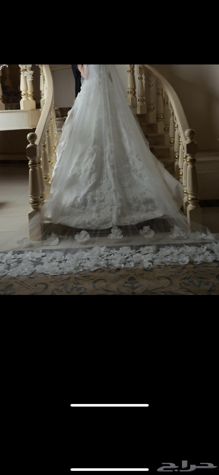 فستان زفاف مع طرحته من المصممة يارا العامر64479762220035110