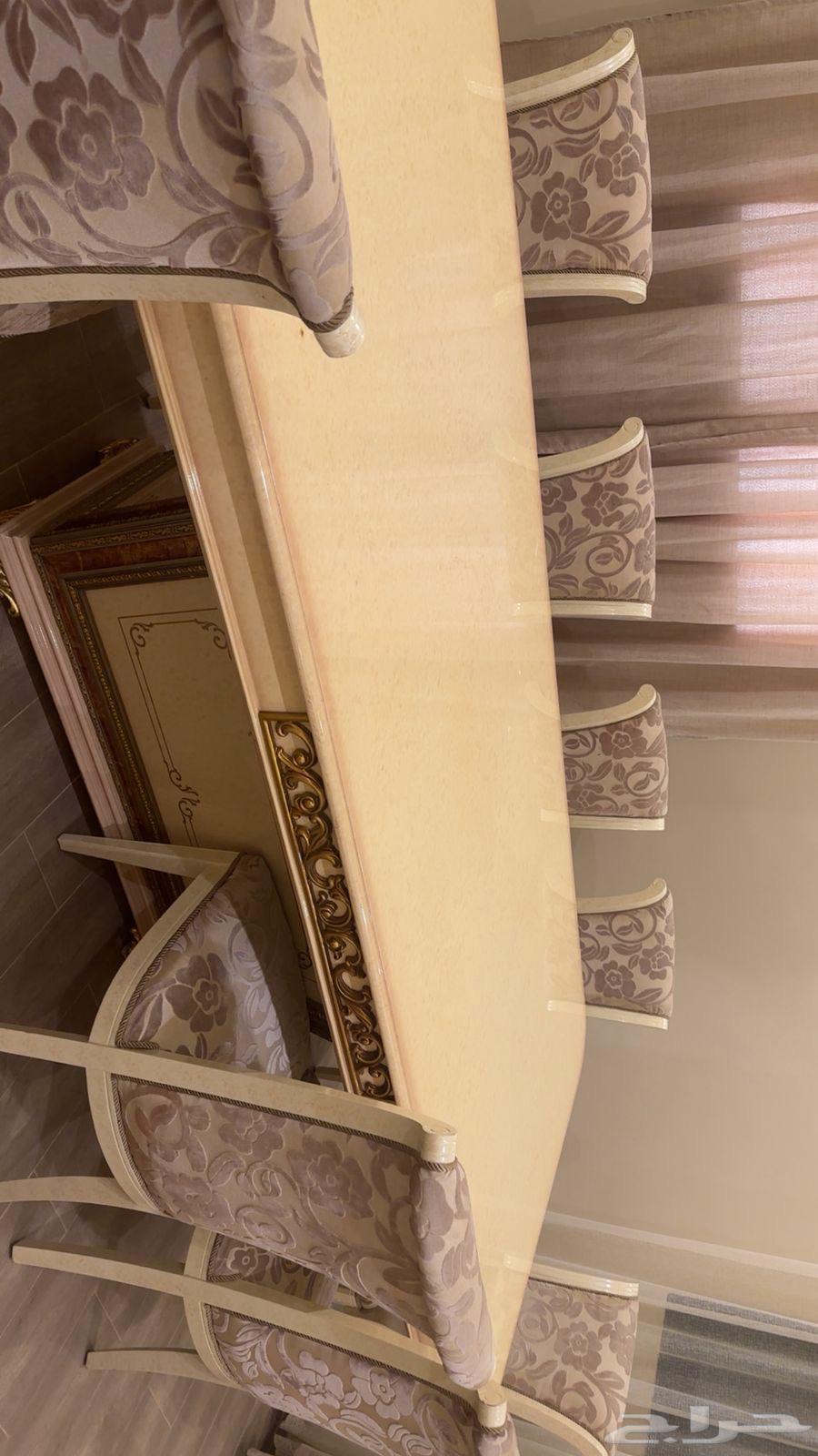 Clean dining table with 10 chairs64482390371458114