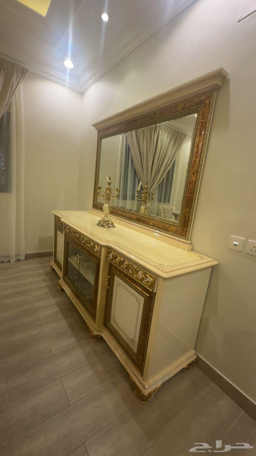 Clean dining table with 10 chairs64482390371458110