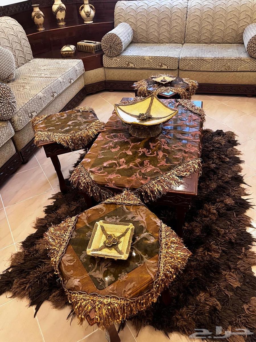 Moroccan sofa set with paintings, side tables, and decorative items for sale64482768927234114