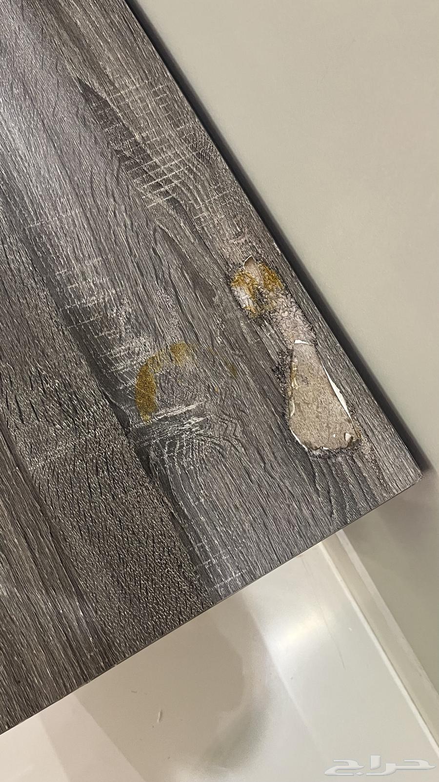 Sofa for sale with carpet, tables, and TV table64491225324035114