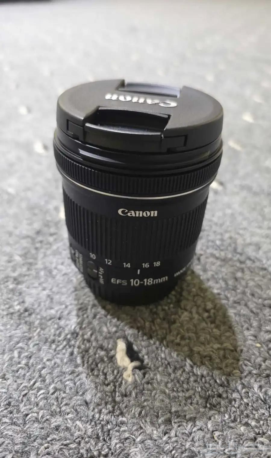 للبيع عدسة 10-18 كانون وستاند64493532586497112