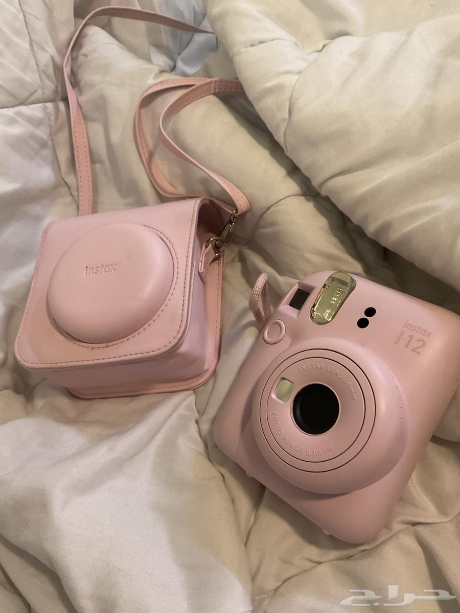 Instant camera with its bag (excellent condition)64491306908291110