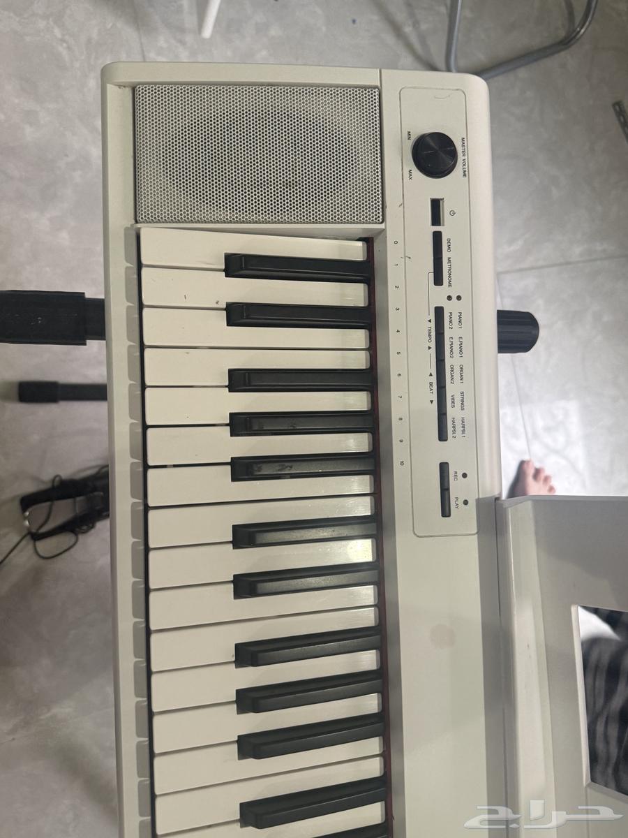 بيانو ابيض64490890299649112