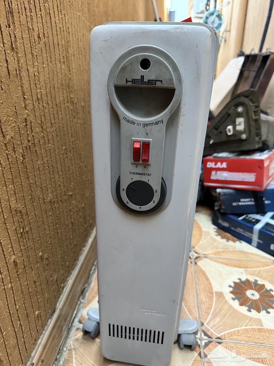 Household appliances for sale: washing machine, two heaters, and a heater64492690572034112