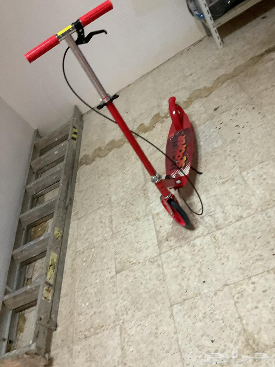 Red scooter, brand new and fast64489503037058111