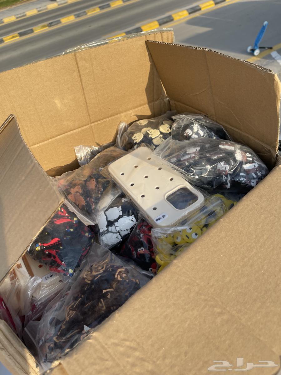 Stock of phone cases, keychains and crocs64491455310722113