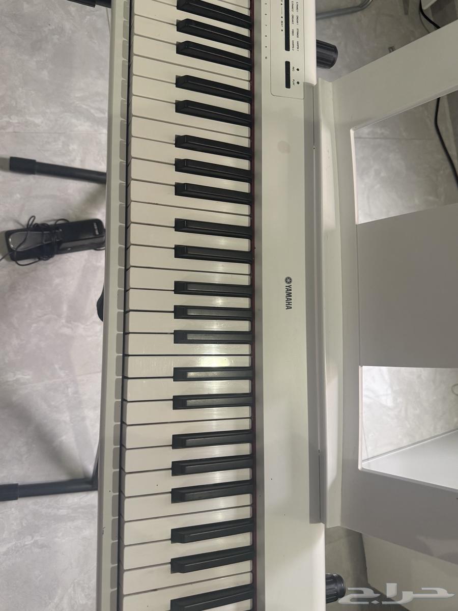 بيانو ابيض64490890299649113