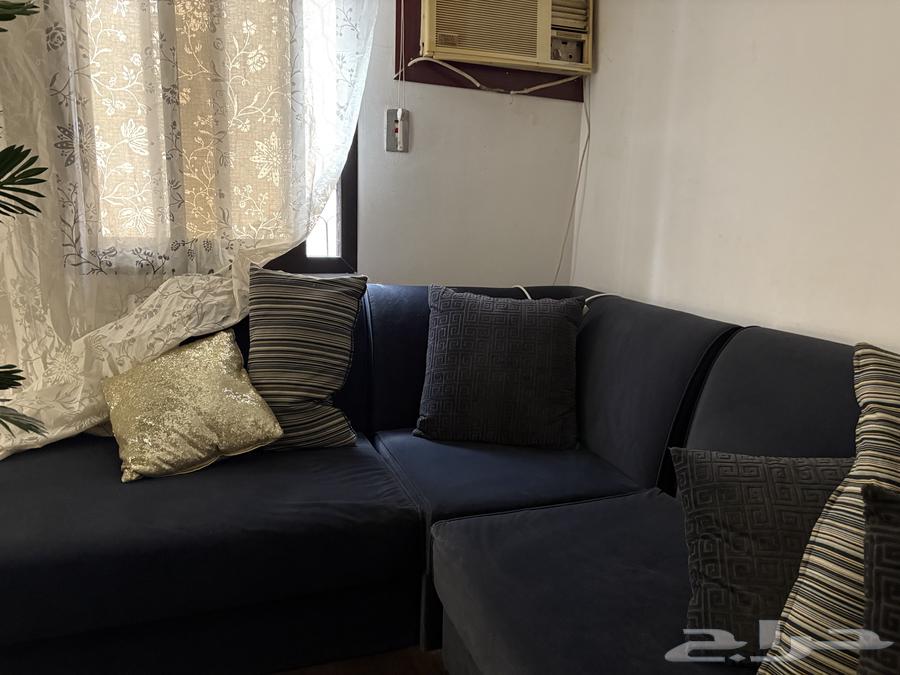 L-shaped sofa with cushions64490906007553111