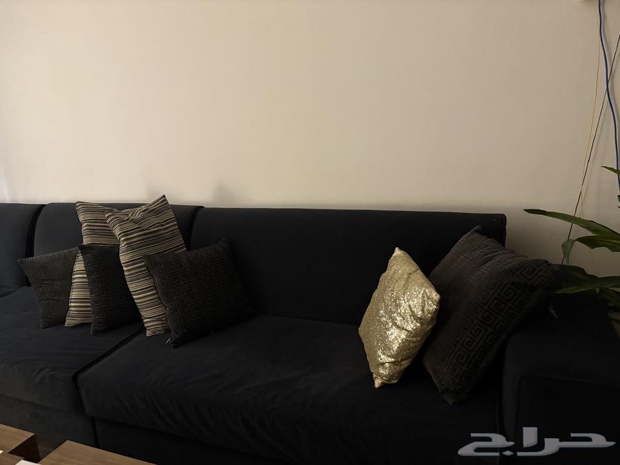 L-shaped sofa with cushions64490906007553112