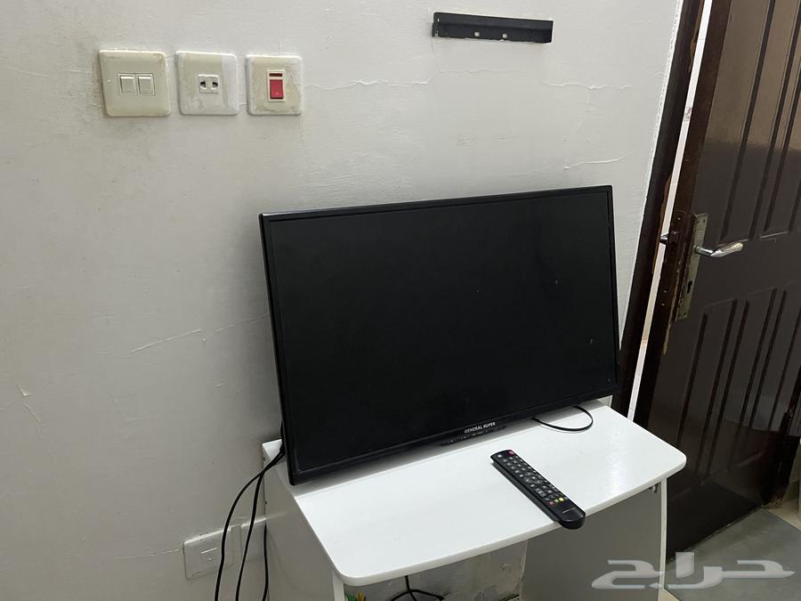 تلفزيونين وطاولة تلفزيون64489766296706112