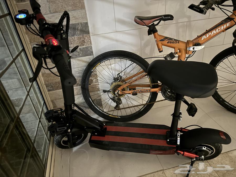 Electric scooter with 48-volt battery and seat, used for only two days64488034847873110