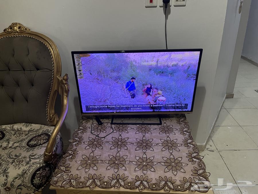 تلفزيونين وطاولة تلفزيون64489766296706110