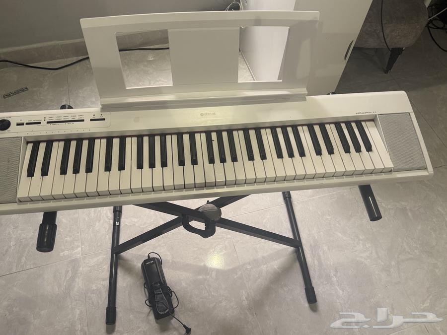 بيانو ابيض64490890299649111