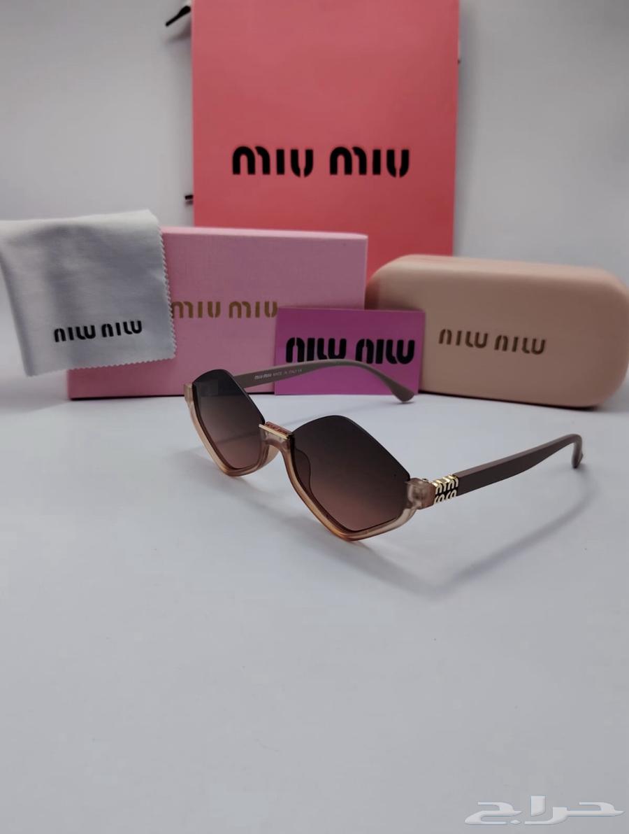 Miu Miu Glasses64500298354946111