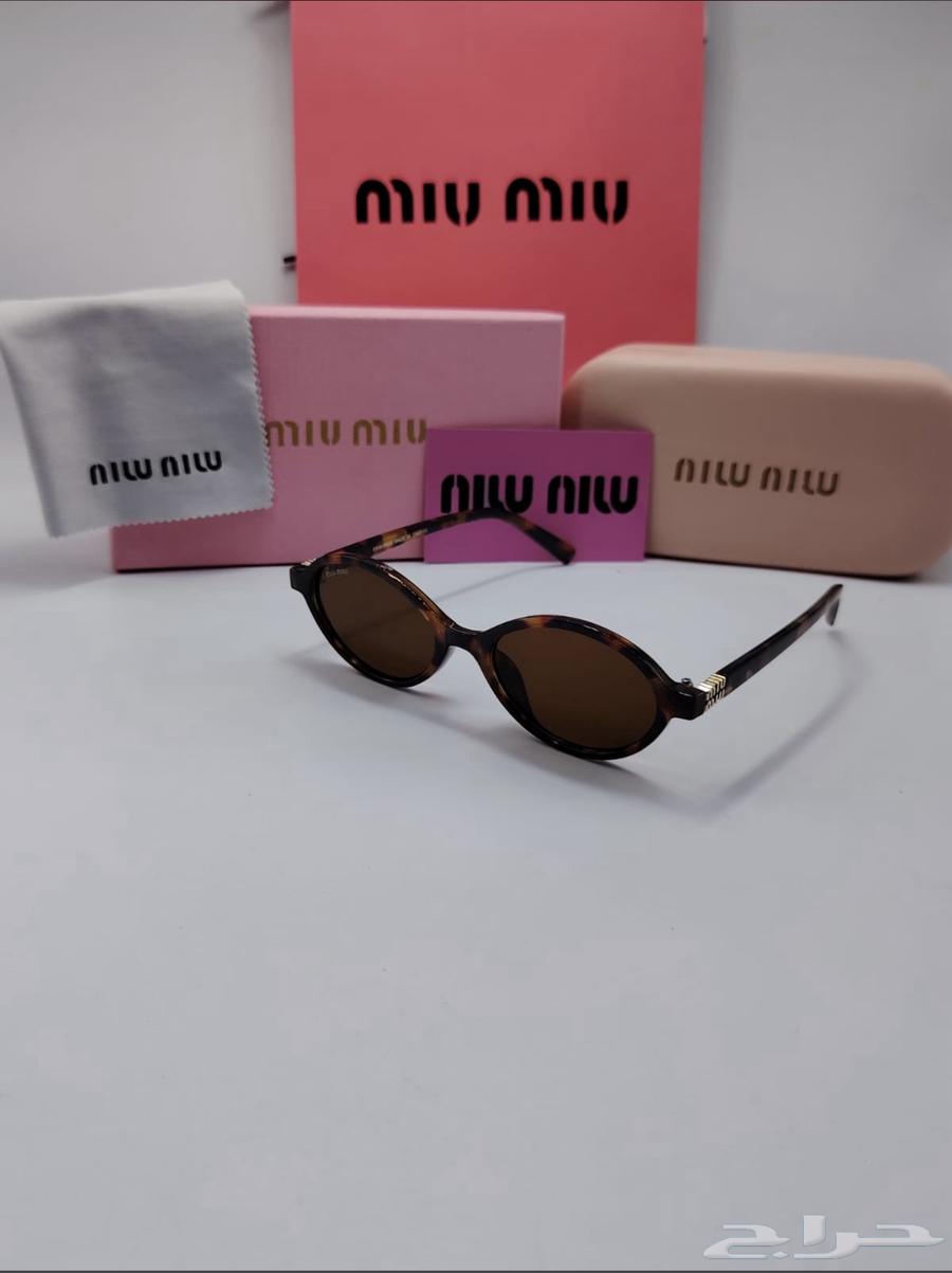 Miu Miu Glasses64500298354946114