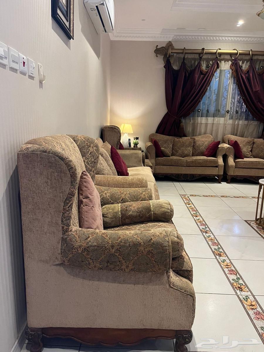 American sofa for sale with curtains, two tables, and an art painting64502336876547112