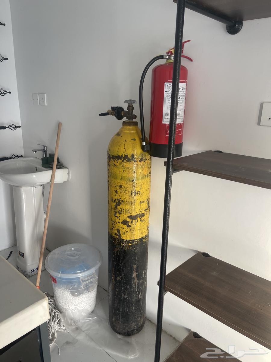 For sale shop door with refrigerator, display case, chairs and table64500923272321112