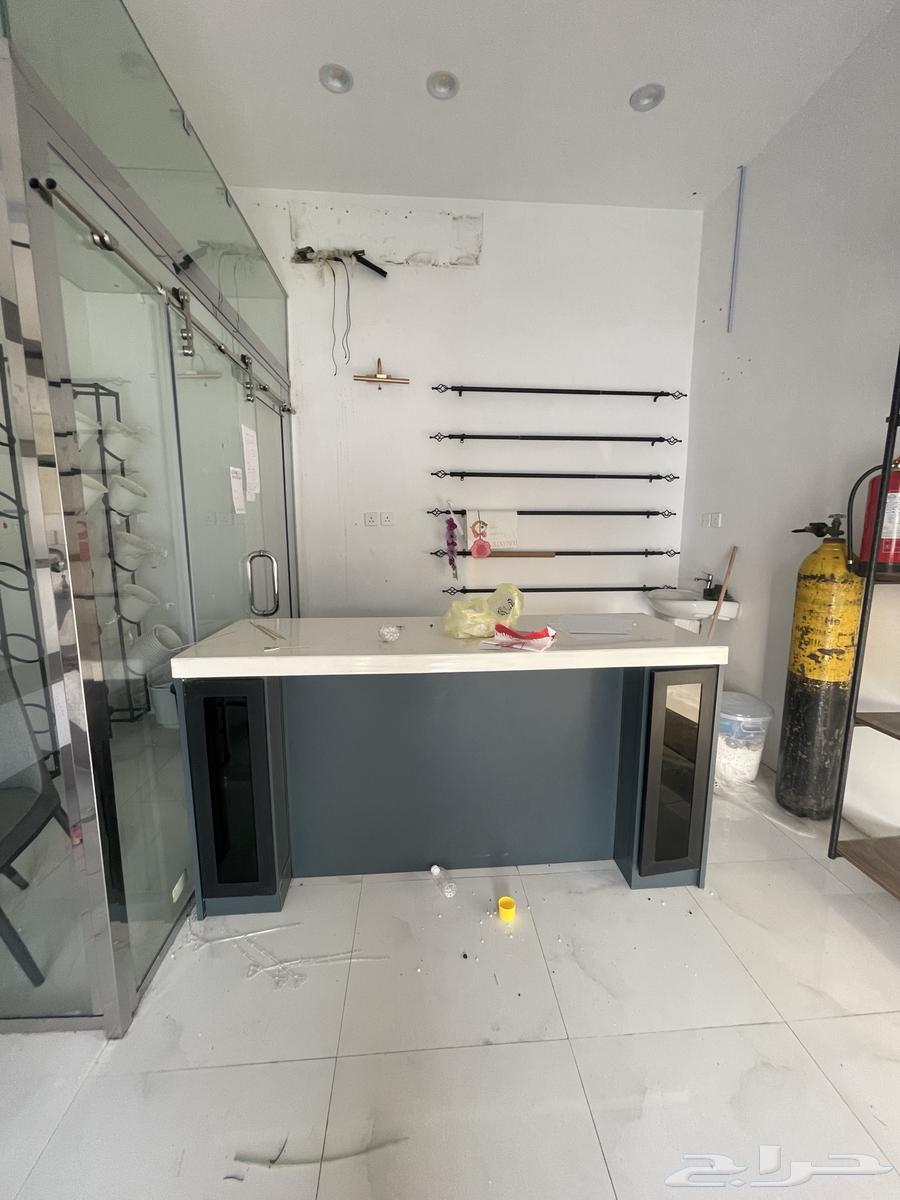 For sale shop door with refrigerator, display case, chairs and table64500923272321111