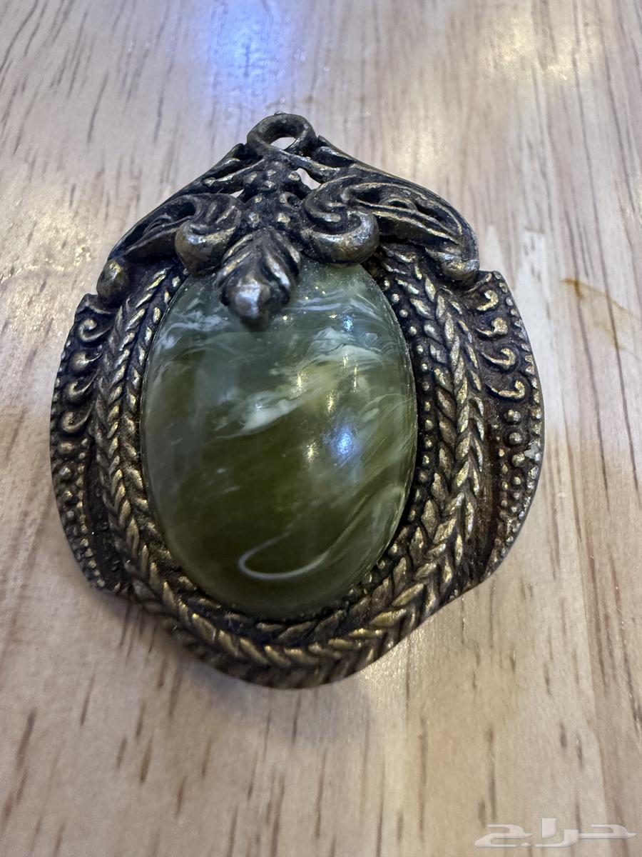 دبوس علاق بحجر كريم64494981908866114