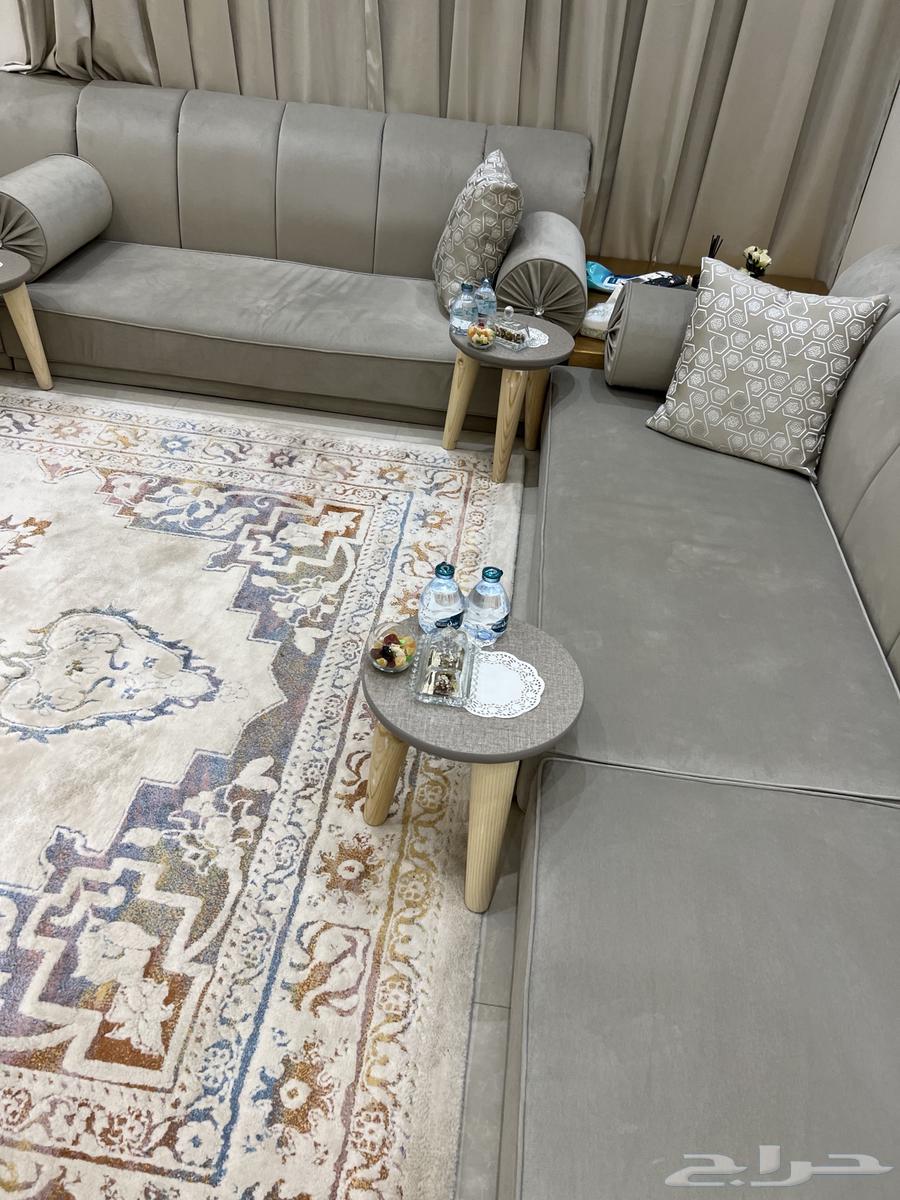 Clean floor sofa with cushions and tables64499619585667110