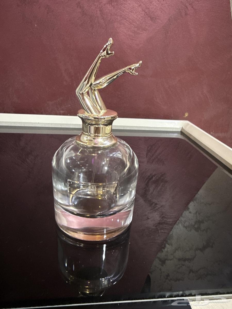 A coin for original perfume. Iskandar and perfume shop64502323111555110