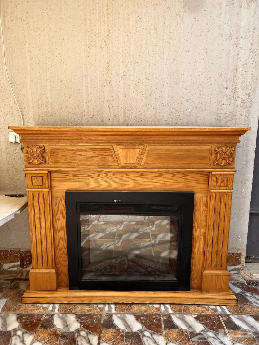 للبيع دفاية كهربائية مع ديكور خشبي فاخر64498020729218110