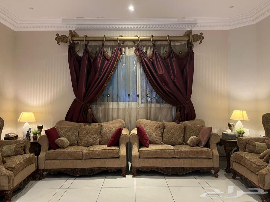 American sofa for sale with curtains, two tables, and an art painting64502336876547113