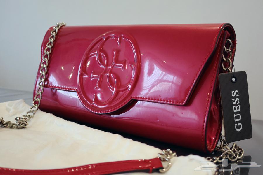 Guess Korry Patent Crossbody Clutch Bagشنطة64497827667075112