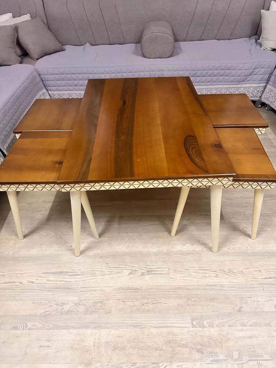 A large table and four side tables64502268479107110