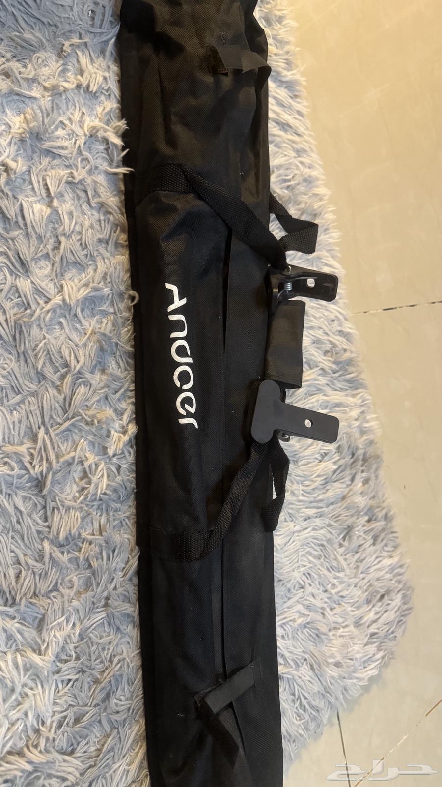 كاميرا كانون 250d مع اضاءة تصوير وحامل خلفيه64507935674241114