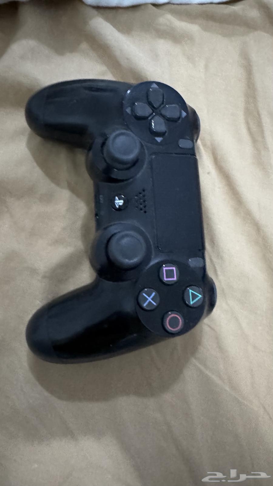 سوني فور برو مع يد سوني اصليه و ثلاث اشرطه موضحه بالصوره64508509062531113