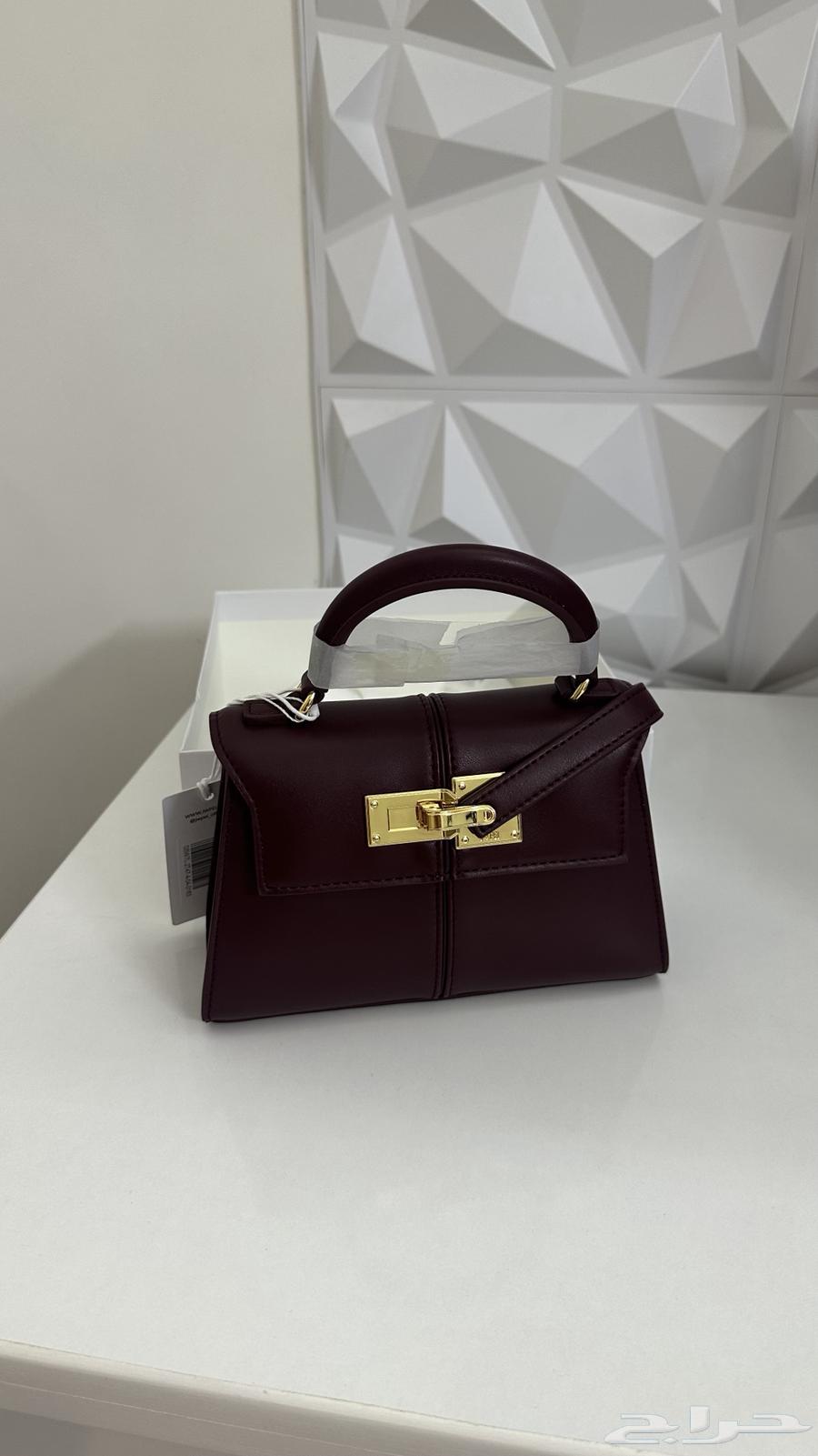 شنطة جديده من ماركة جوي بي لون ( برغندي ) حجم (ميني )64510154204802111