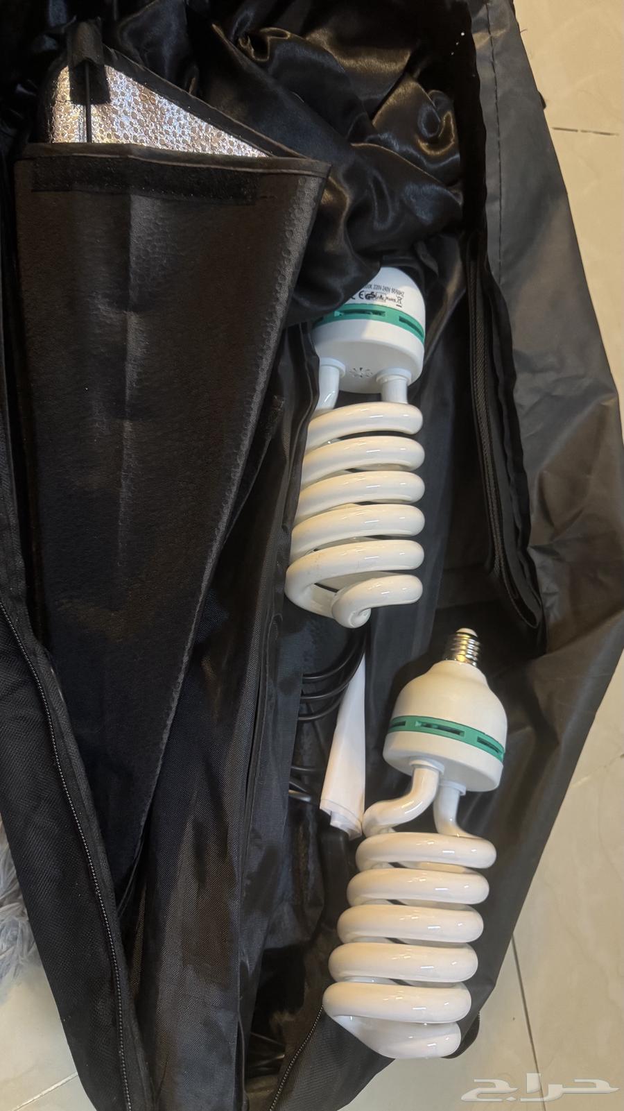 كاميرا كانون 250d مع اضاءة تصوير وحامل خلفيه64507935674241113