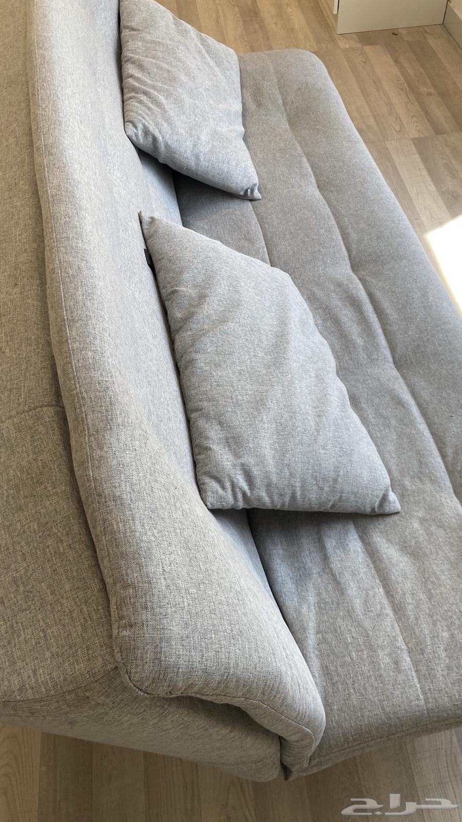 Sofa that converts into a two-piece bed with pillows, used for storage64505190111363113