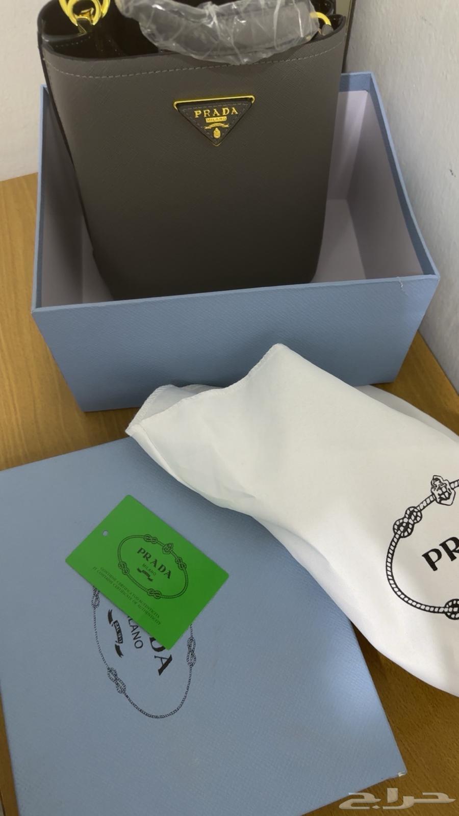 شنطة برادا رمادية درجة اولى جديدة64503322347267112
