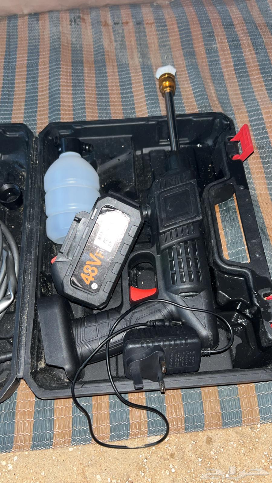 مسدس ماء معه بطريه64509335737601111