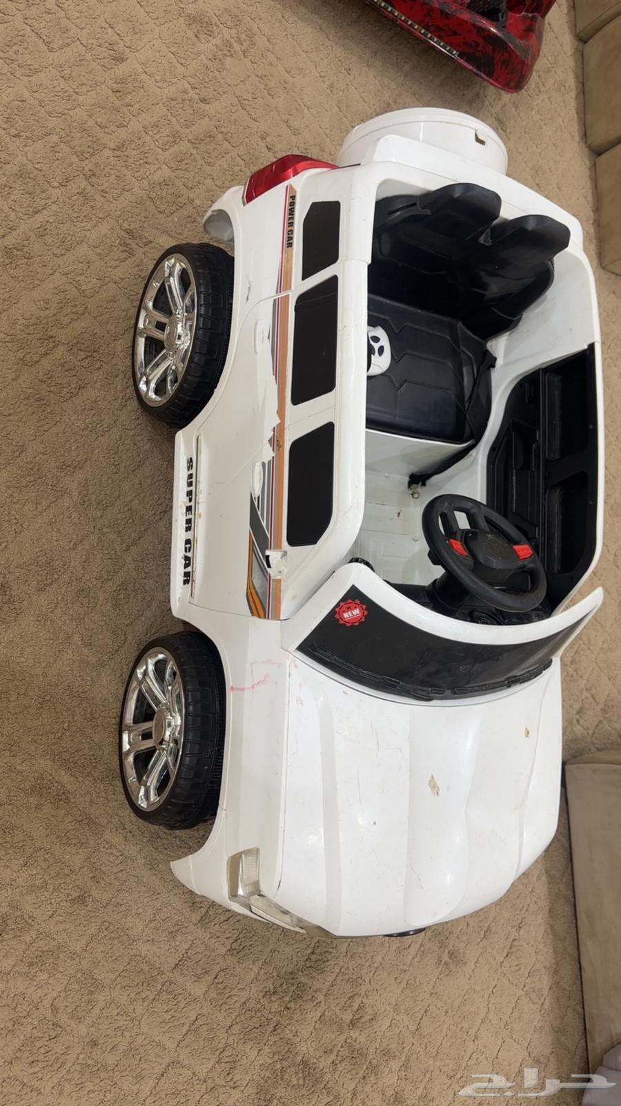 سيارة اطفال بحالة جيده ويوجد معه شاحن64503857283585110
