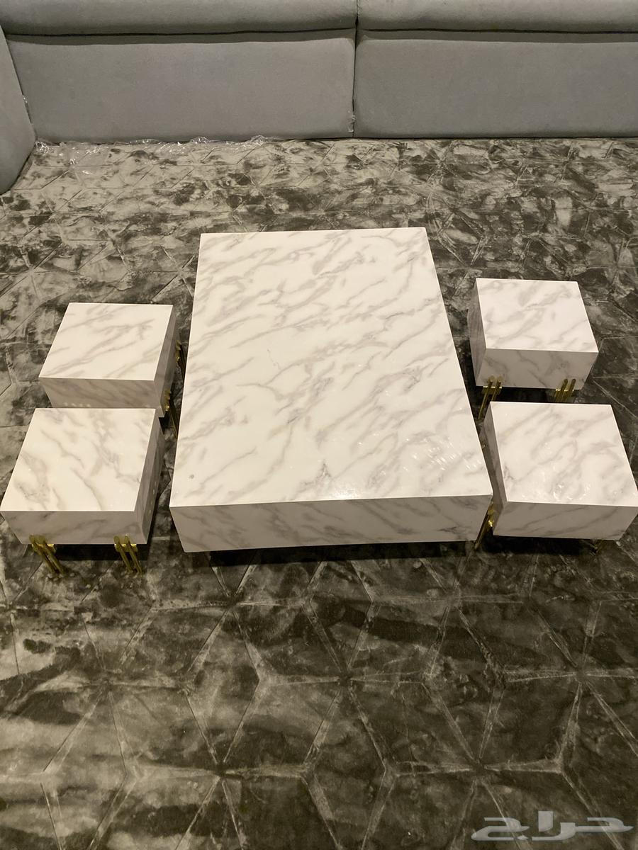 A large table with four small ones64507263355138110