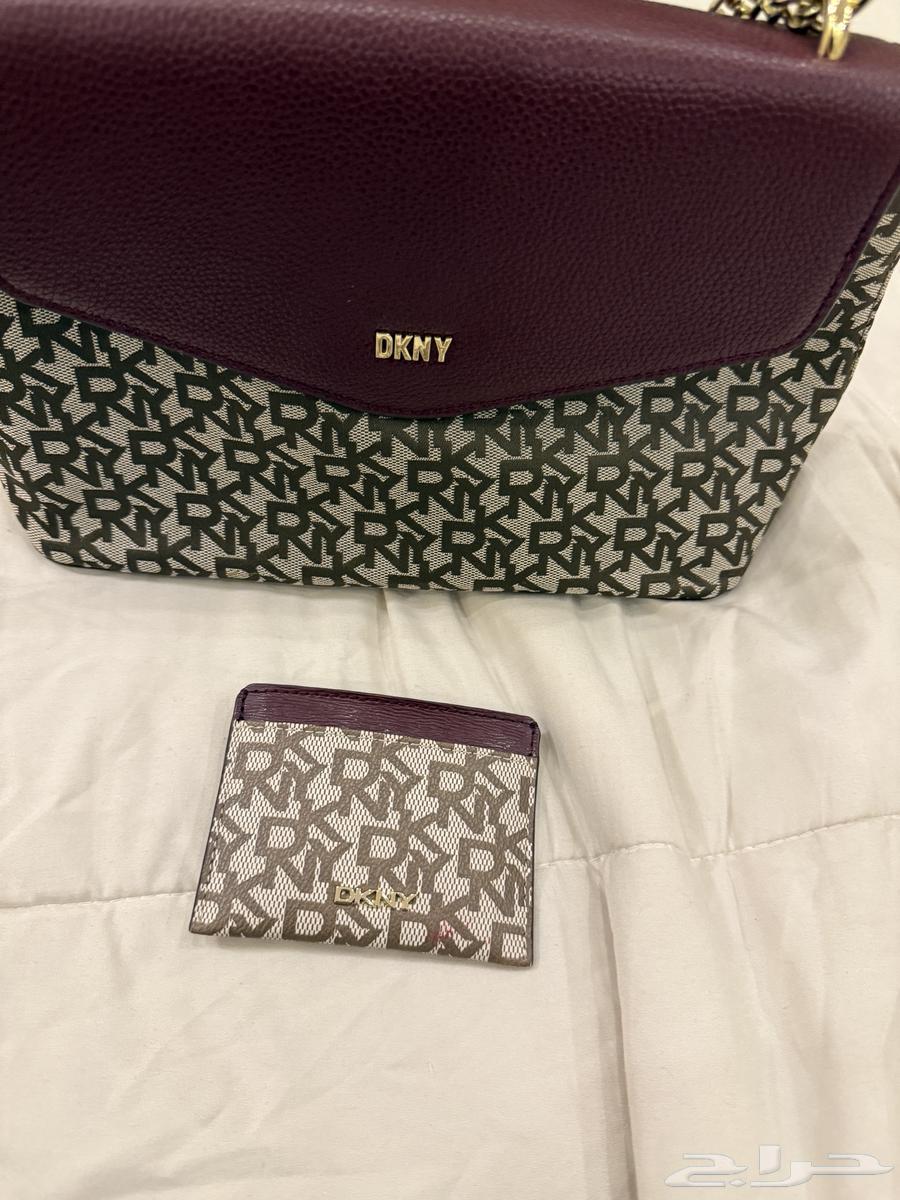 شنطه كتف وكروس بودي ماركه دكني (اصليه )64509870596481113