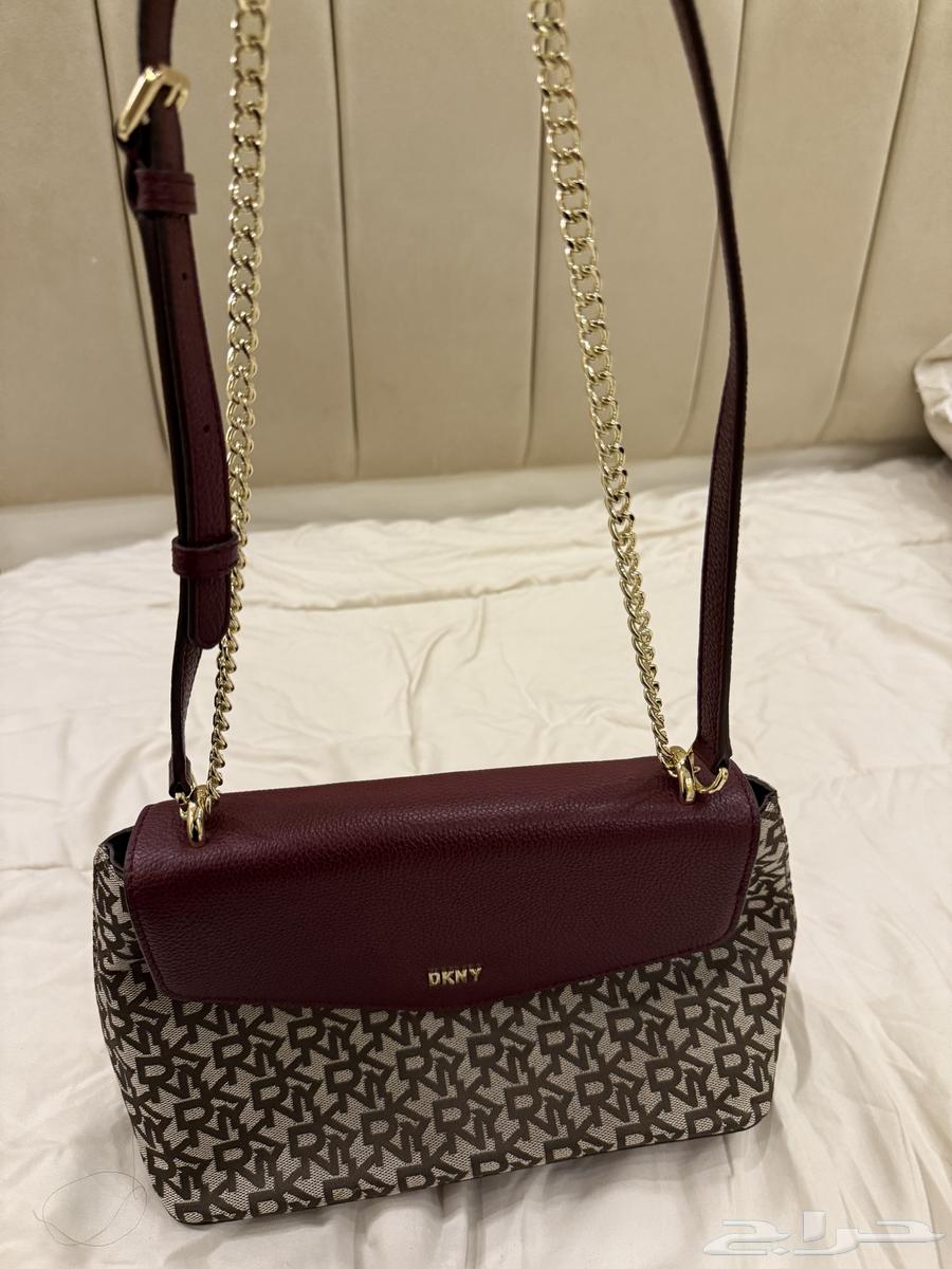 شنطه كتف وكروس بودي ماركه دكني (اصليه )64509870596481112