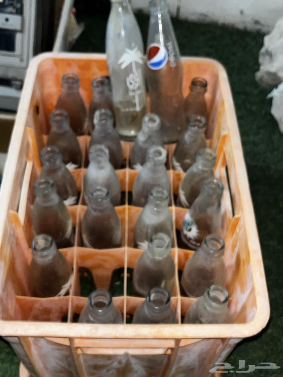Devices, boxes with Pepsi, and old collectibles64507067989121110