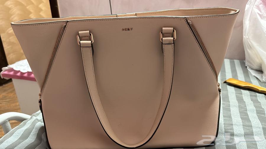 شنطة دكني اصلية 100  10064508327153282111