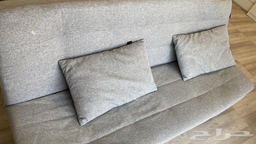 Sofa that converts into a two-piece bed with pillows, used for storage64505190111363112