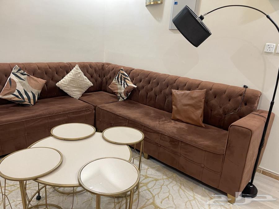 L-shaped living room sofa with tables and carpet64509013312387110