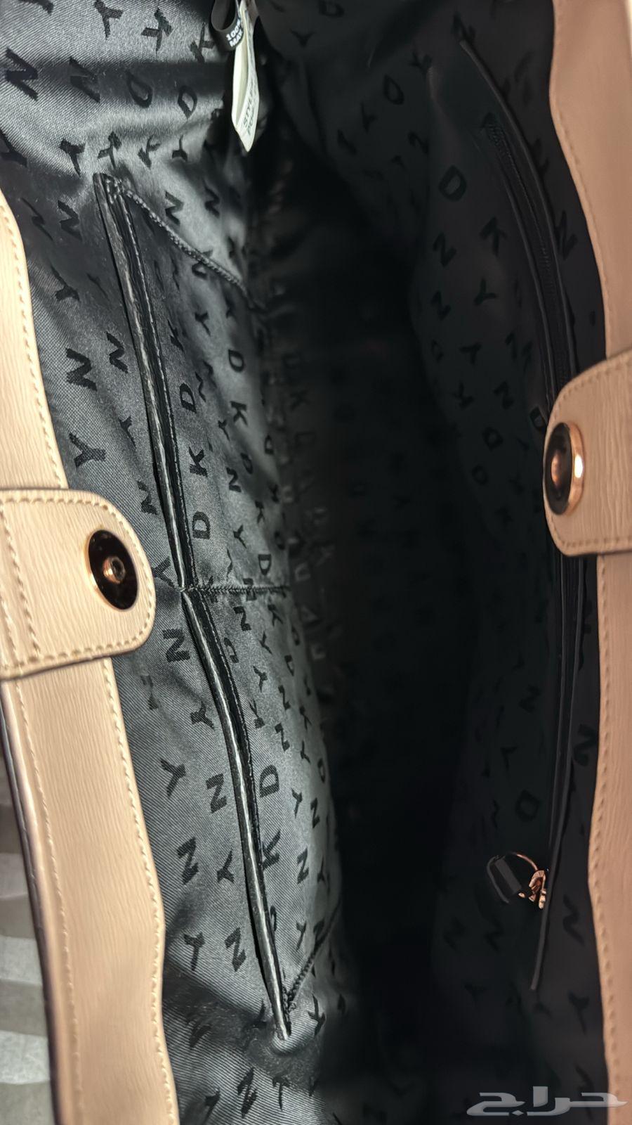 شنطة دكني اصلية 100  10064508327153282110