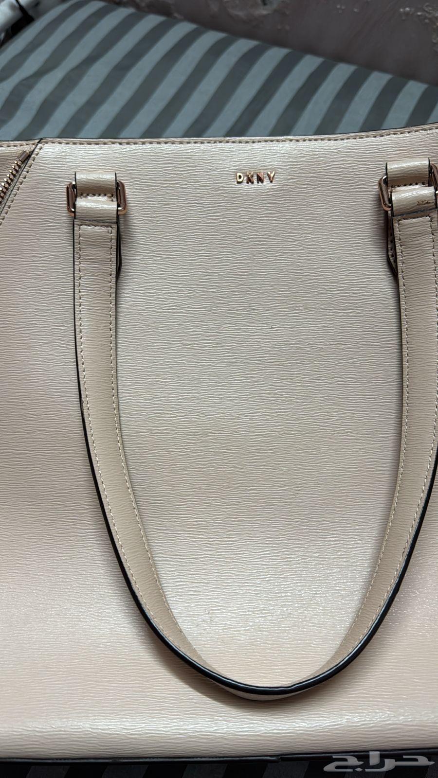 شنطة دكني اصلية 100  10064508327153282112