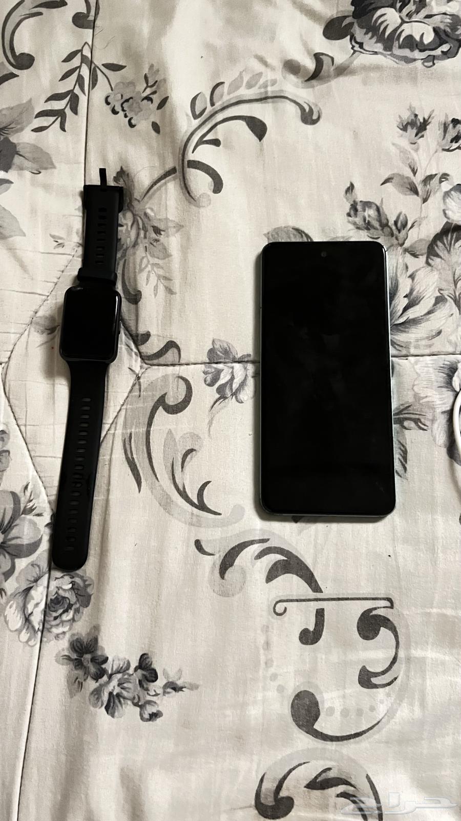 جوال 128 قيقا و ساعه هووي64513229646465110