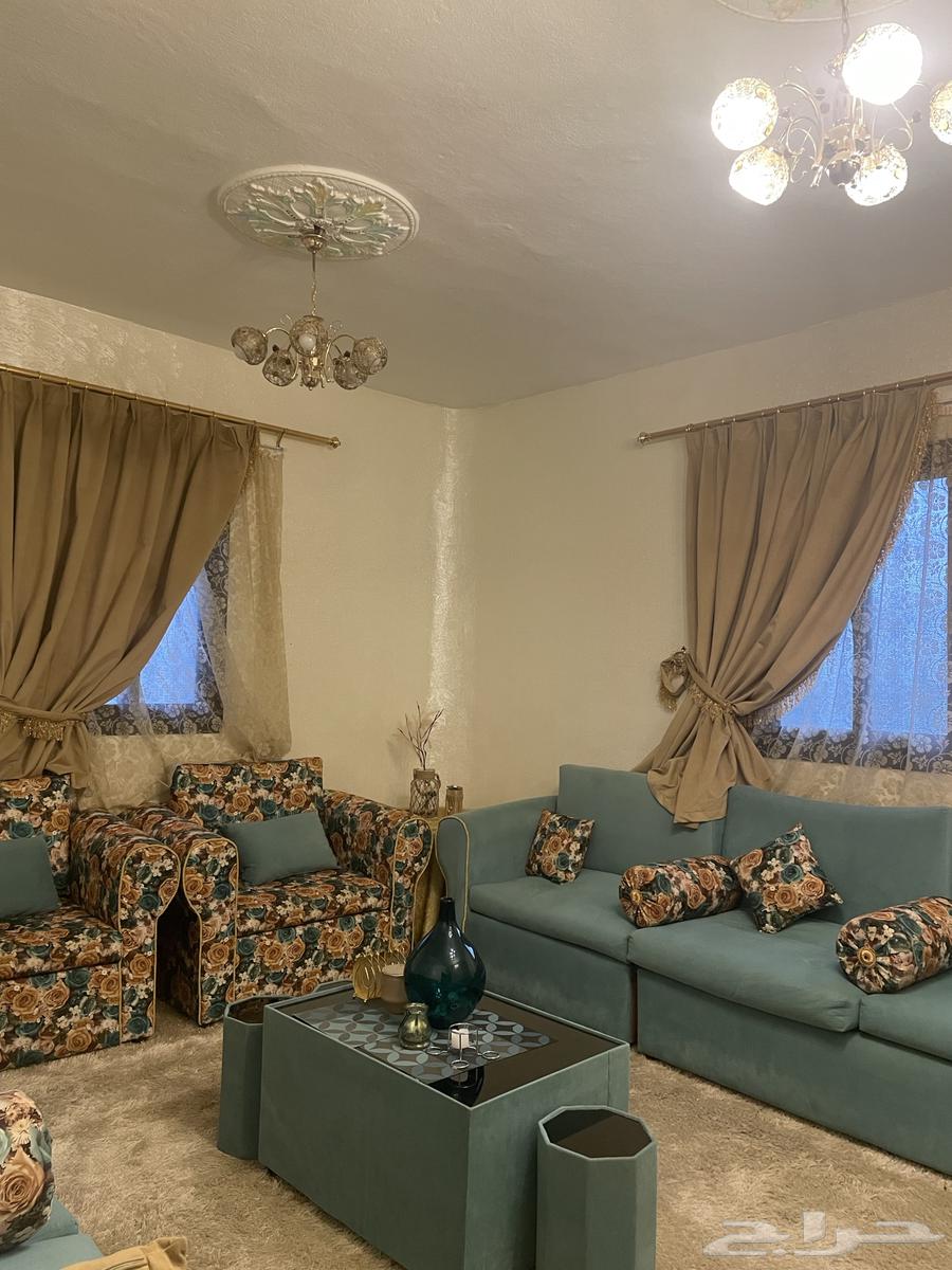 He has a new and clean sofa with the side tables64515877743363110