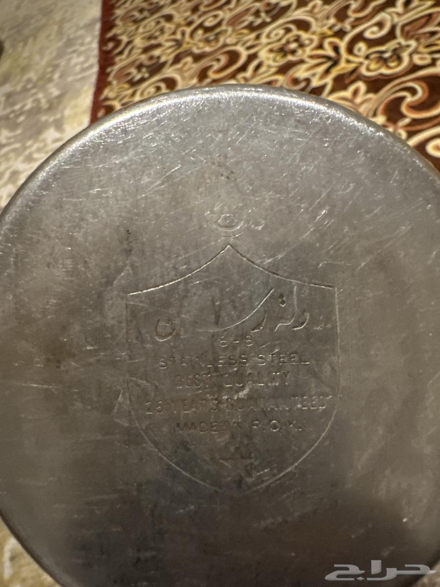 Two sealed small-sized Raslan teapots64511099893891113